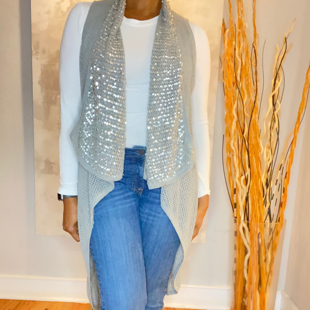 Gianni Bini silver long sleeveless cardigan.